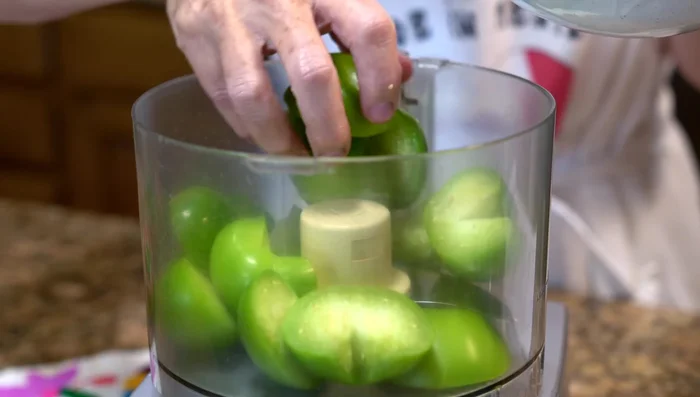 Make avocado salsa: Blend green tomatoes, serrano chiles, cilantro, and salt. Add avocado and blend until smooth.