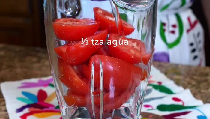 Blend raw tomatoes with a little water until smooth.