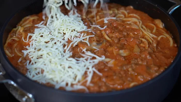 Add cheese, cover, and let melt.