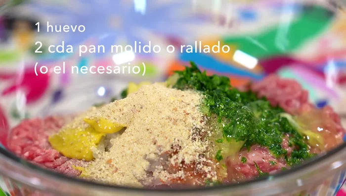 Add grated breadcrumbs to the mixture.