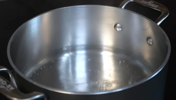 Boil water with a cinnamon stick until the cinnamon releases its flavor.