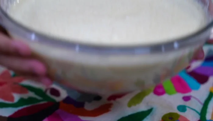Pour the mousse into serving glasses or a container.