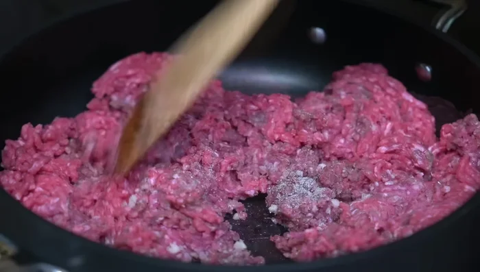 Cook the ground beef, stirring constantly, until evenly cooked and browned.