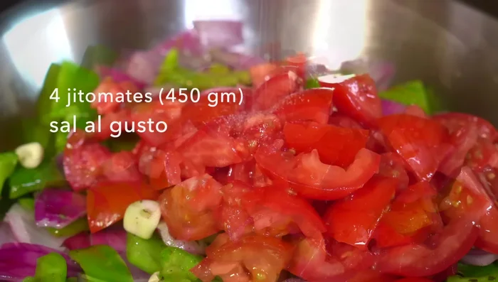 Add 4 tomatoes and achiote paste for color. Cover and simmer for 10 minutes. Turn off heat and let cool.