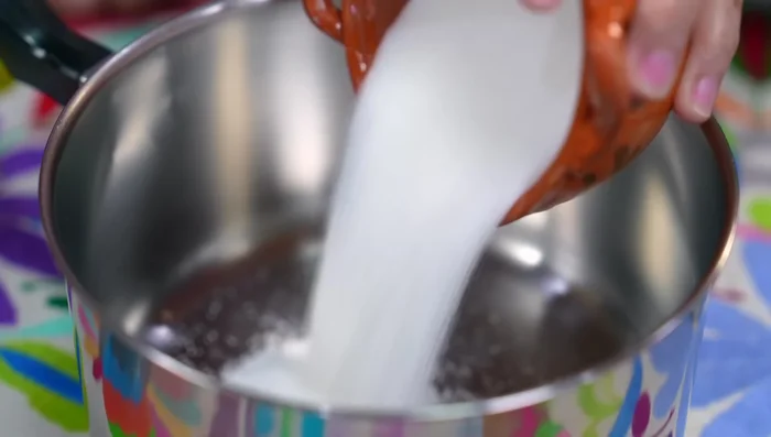 In a saucepan, combine sugar, cornstarch, cocoa powder, and salt. Whisk until well integrated.