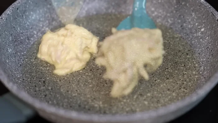 Heat oil in a pan. Form chicken mixture into small patties and fry until golden brown on both sides.