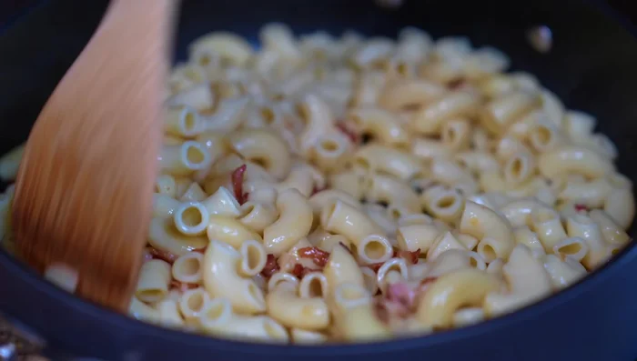 Add the blended sauce to the pan and heat through.