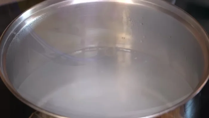 Cook pasta according to package directions in boiling water with 2 teaspoons of salt.
