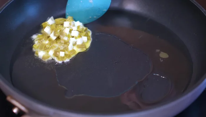 Heat oil in a frying pan over medium-low heat. Form small pancakes using a spoon and fry until lightly golden on both sides.