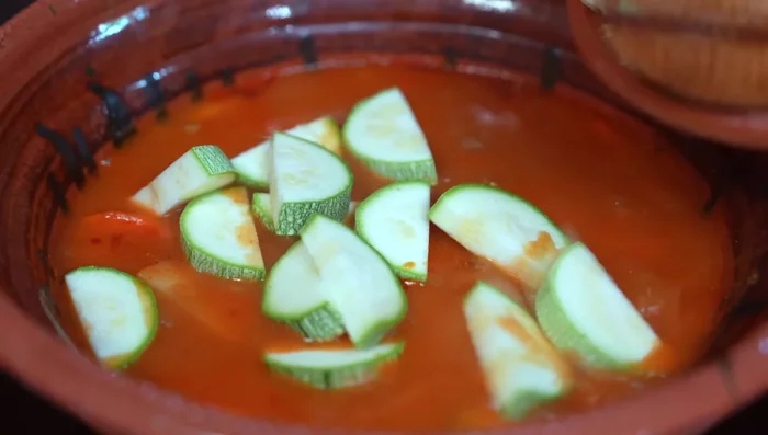 Add zucchini and poblano peppers, stir, cover, and cook until vegetables are tender (about 15 minutes).