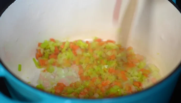 Add the blended tomato mixture to the pot, season with salt, and simmer for 6 minutes.