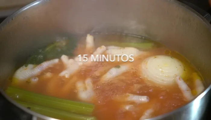 After 15 minutes, remove the onion, celery, and garlic from the pot. Add the carrots and chayotes (they take longer to cook).