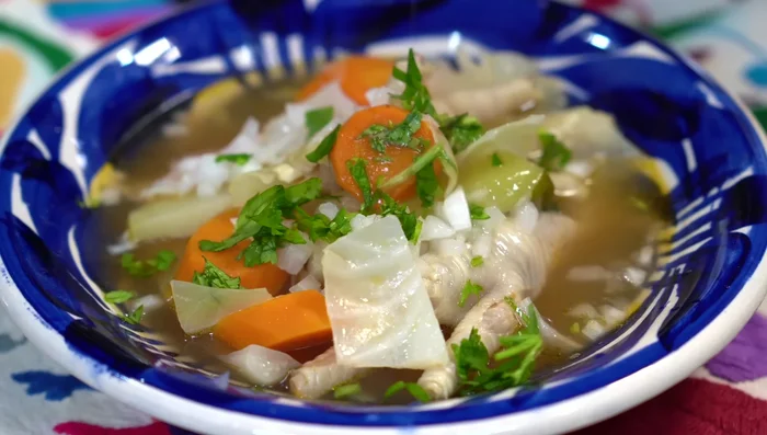 Serve hot with chopped onion, cilantro, a squeeze of lemon, and warm corn tortillas.