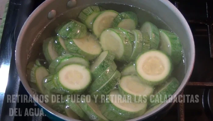 Remove zucchini from water and drain well. Reserve the cooking water for the tomato broth.