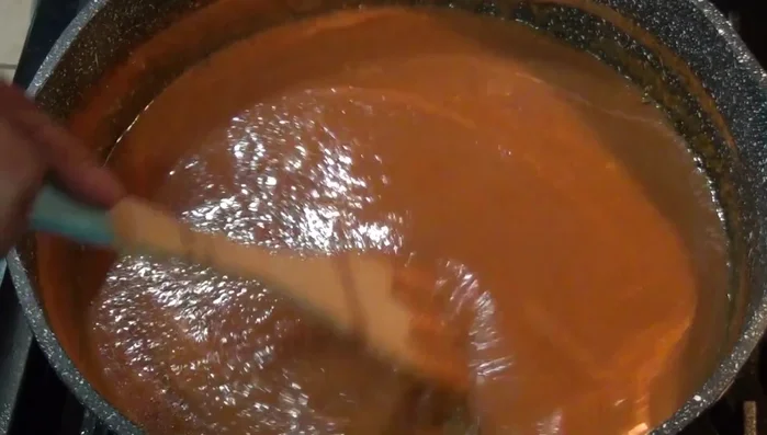 Add the browned meatballs to the tomato sauce. Add the bay leaf and allspice.