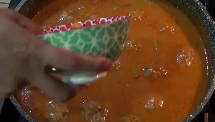 Add the chopped zucchini and carrots. Add more water if needed to thin the sauce.