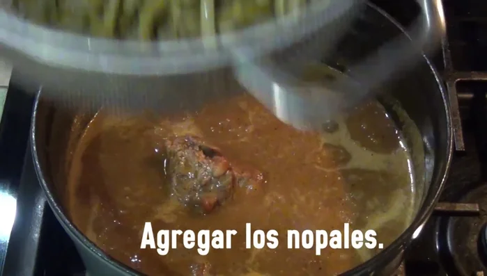 Add the steamed nopales to the pork rib mixture. Season with salt to taste and simmer until the nopales are tender.