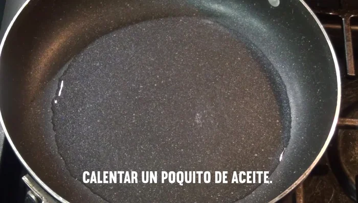 In a separate pan, fry a little onion until golden brown.