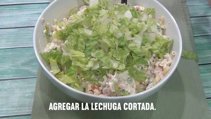 Add chopped lettuce and pickled chilies.