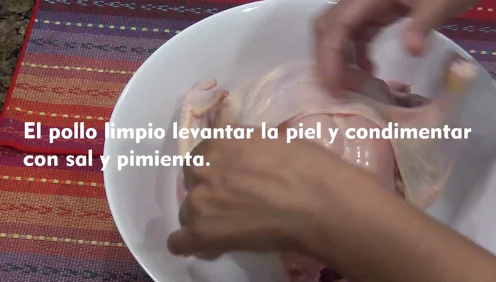 Prepare the chicken: Wash the chicken thoroughly. Lift the skin and make cuts to allow for better marinade penetration.