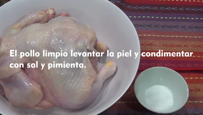 Season the chicken: Rub the chicken inside and out with salt and black pepper.