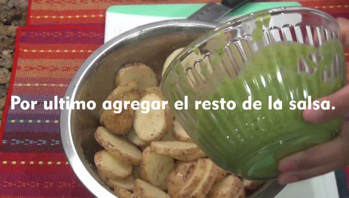 Assemble and bake: Arrange the potatoes in the ovenproof container around the chicken. Add remaining green sauce.