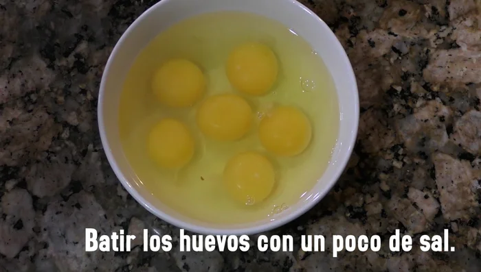 Season the eggs with salt.