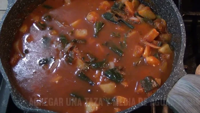 Simmer over medium heat until potatoes are cooked through and sauce has thickened.