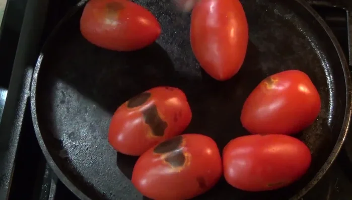 Roast tomatoes until soft. Let cool.