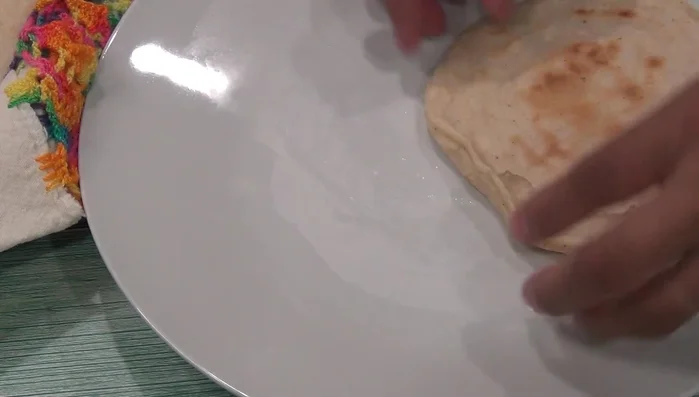 Assemble the picadas: Gently pinch the cooked tortillas to create a small pocket. Fill with the nopal mixture, then add refried beans, fresh cheese, and your choice of sauce.