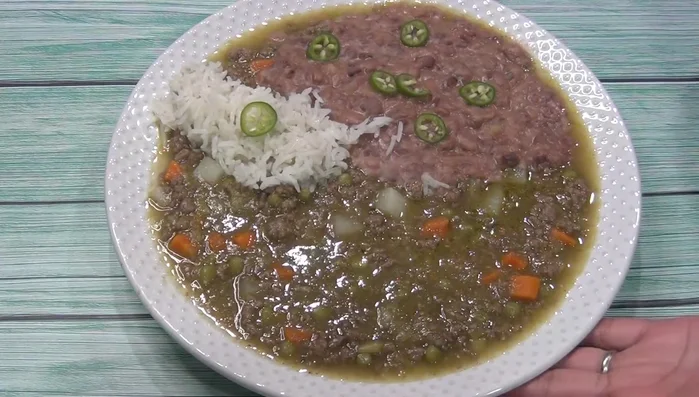 Serve the stew with refried beans and rice.