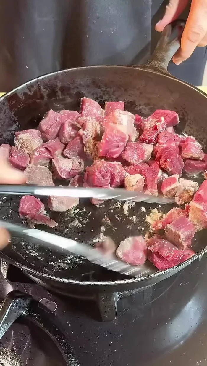 Stir to sear the beef.