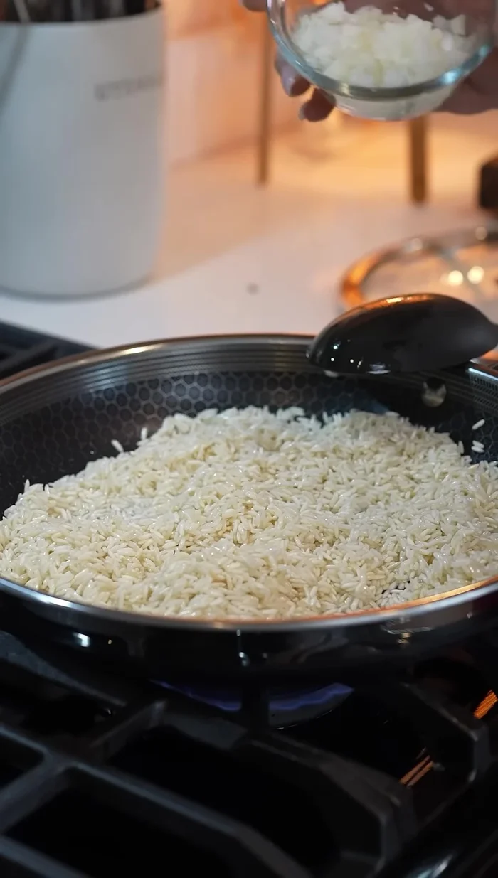 Add 1/4 of a chopped onion and continue frying for 2 more minutes.