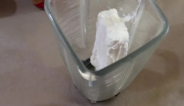 In a blender, combine cream cheese, half and half, evaporated milk, condensed milk, and lemon juice. Blend until smooth.