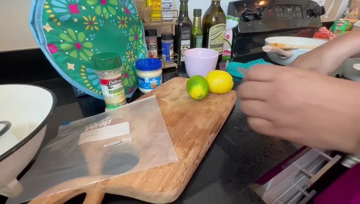 Prepare the sauce. In a bowl, combine mayonnaise, lemon juice, lime juice, Everything Bagel seasoning (or paprika if available), and a little Parmesan cheese. (Start at 221.519)