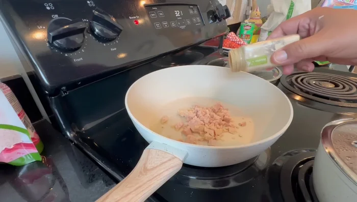 Season the chicken with garlic and salt. (Start at 369.72)