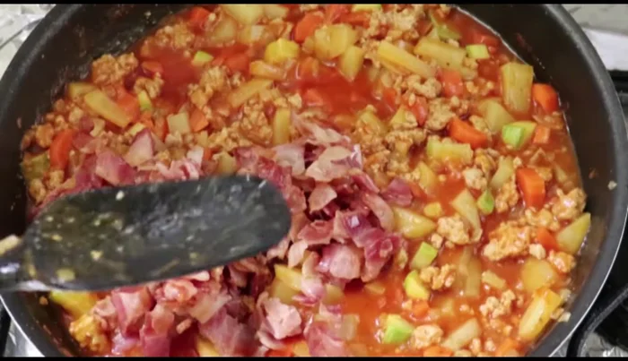 Add the cooked bacon and stir to combine. Fry for another minute.