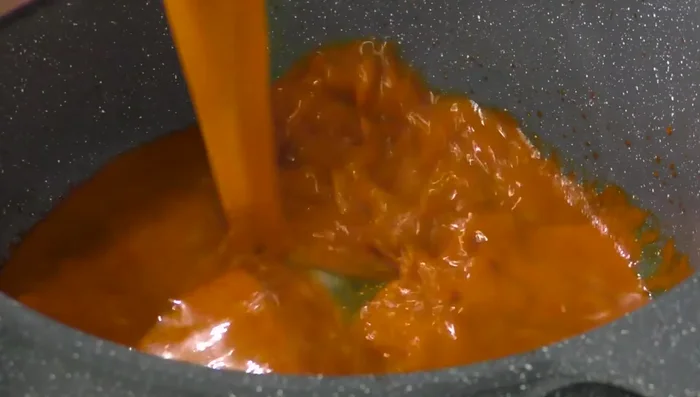 Add 5 cups of water (or chicken/beef broth) to the sauce.
