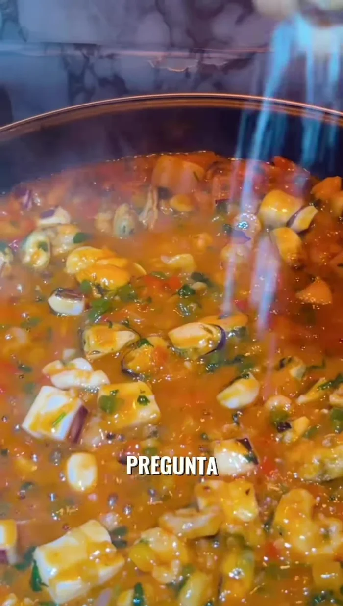 Stir the rice and tomatoes.