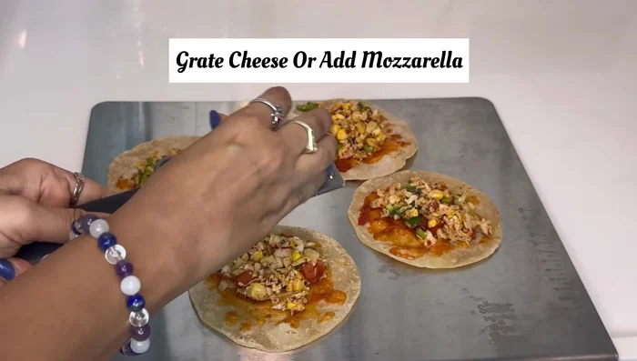 Add cheese on top of the stuffing.