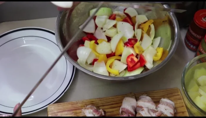 Assemble the skewers: onion, chicken, bell pepper, pineapple, repeat.
