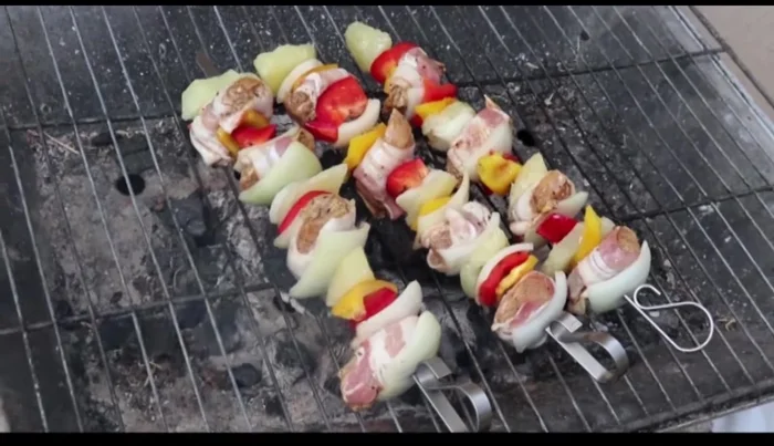 Grill the skewers, turning frequently, until the chicken is cooked through.