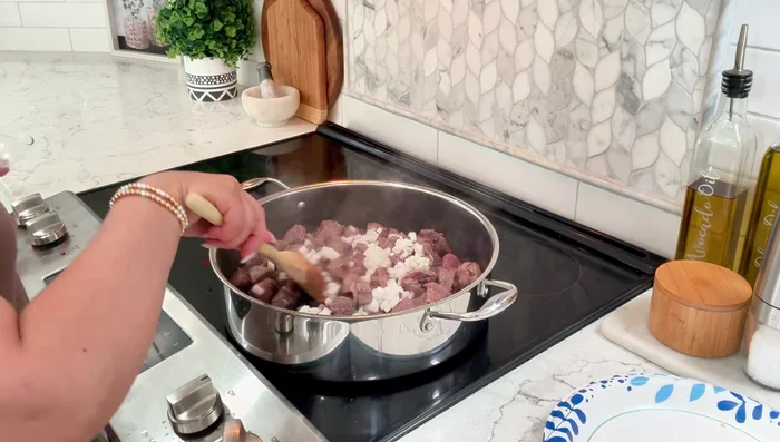 Add half a chopped onion and cook for about a minute to soften.