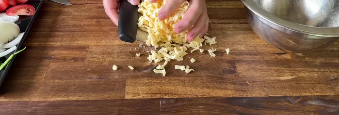 Prepare the cheese blend: Mix pepper jack and quesadilla cheese together. (123.04-140)