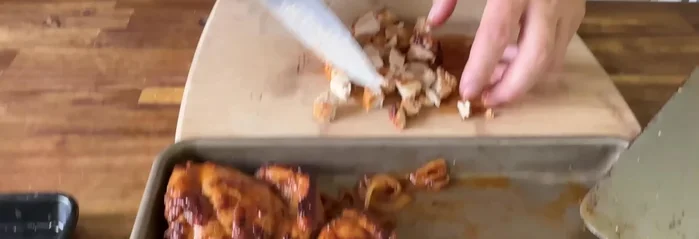Combine and cook: Add the sliced chicken and reserved onions back to the griddle. (262.88-275.6)