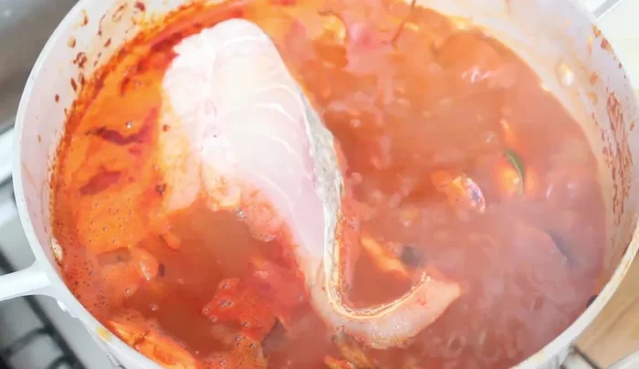 Finish: Add fish and shrimp during the last 10-15 minutes of cooking. Season with shrimp broth cubes (or salt) to taste.