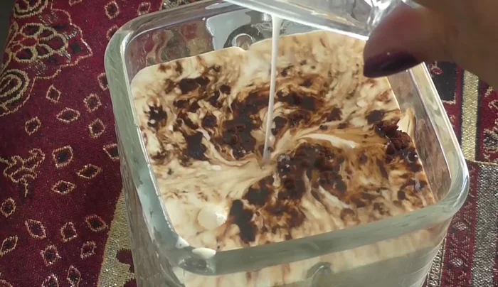 Combine and blend: Add the melted gelatin to the milk mixture in the blender and blend until smooth (131).