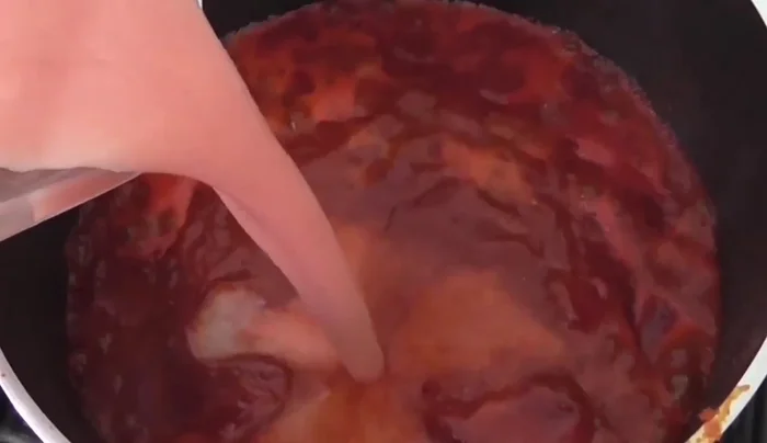 Add the tomato-onion-garlic mixture to the chili sauce. Simmer for about 5-10 minutes until slightly thickened.