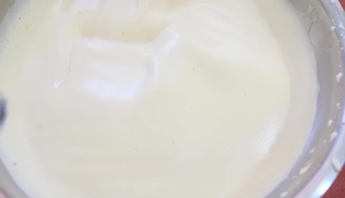 Add milk, vanilla extract, condensed milk, and melted butter (or margarine/oil) to the beaten eggs. Beat well.