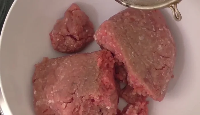 Combine ground meat, soaked rice, and the tomato mixture.